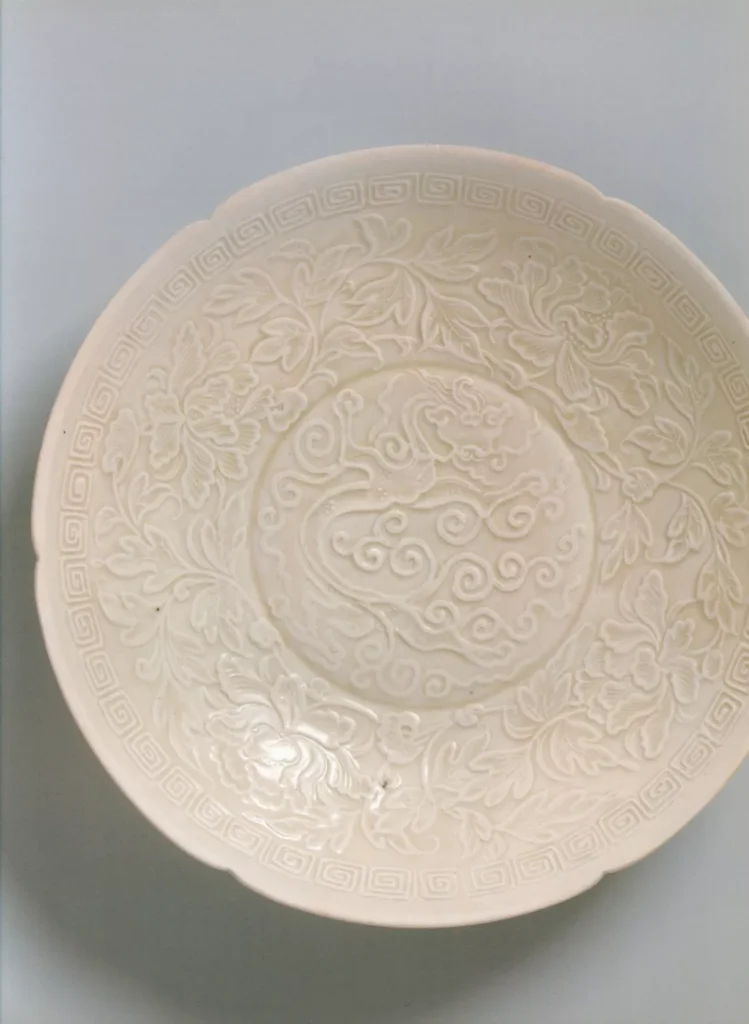 White porcelain bowl with dragon pattern
