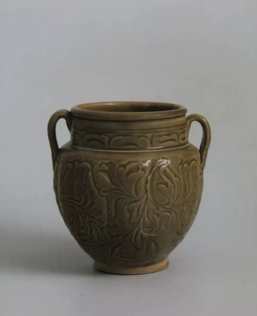 Green-glazed two-ear jar